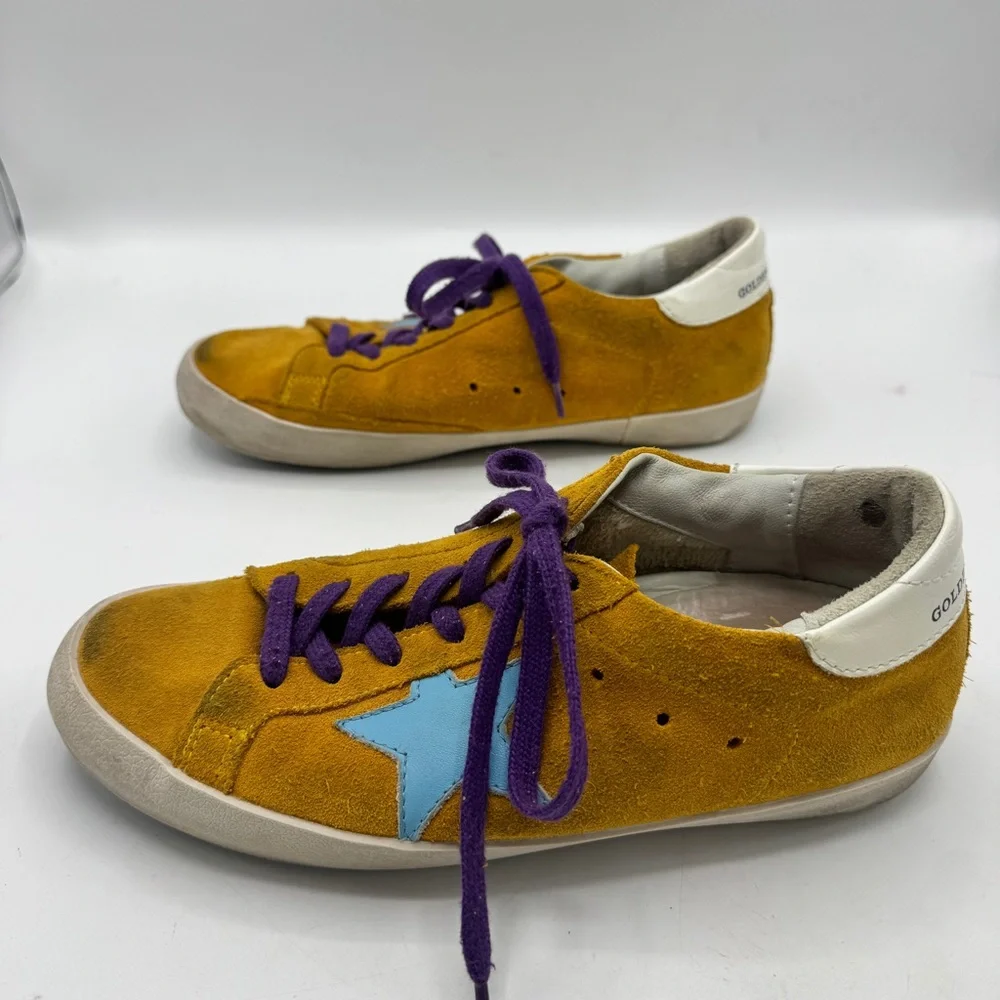 Golden Goose Yellow Suede Sneakers with Purple Laces and Teal Star